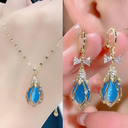 Blue Hibiscus Cat's Eye Stone Necklace &Ear Buckle Set