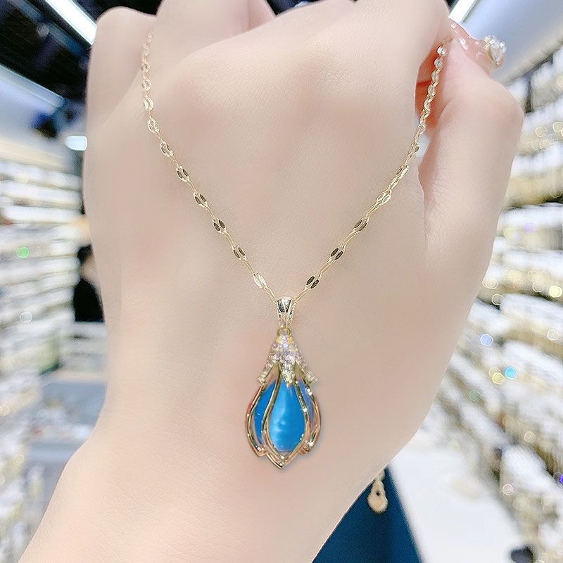 Blue Hibiscus Cat's Eye Stone Necklace &Ear Buckle Set